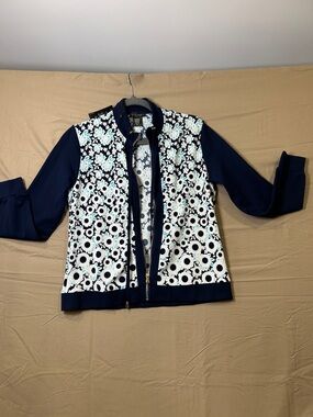 Mystery New York   Navy blue and white floral pattern  with zip up front.